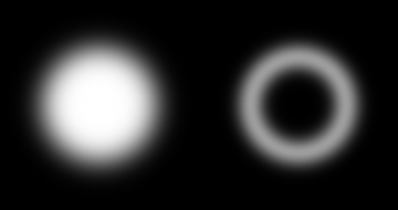 A blurred circle next to a blurred ring